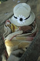 Hats decorated with a daisy on a fake baby Cambodia