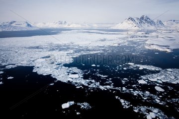 Ice and mountainous coast Ammassalik Greenland