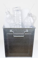 Recyclable PET bottles in a steel container