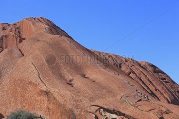 Climbing Ayers Rock in the Uluru-Kata NP TjutaAustralia