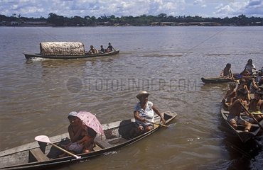 People coming to beg at passing vessels Amazon