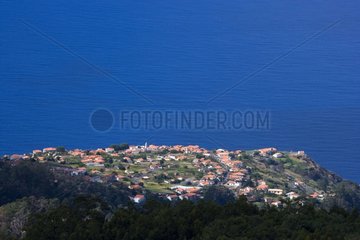 Village on coast and Atlantic ocean Madeira Island Portugal