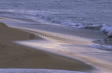 Waves on the beach of Porto Ferro Alghero Sardinia