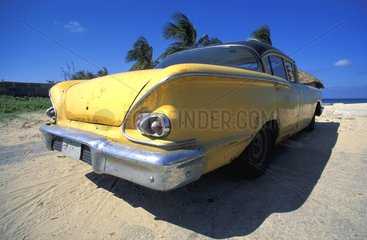 Old American car on a beach
