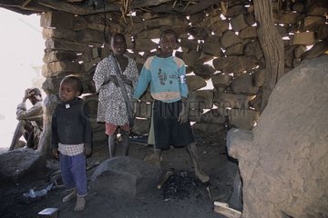 Children in a forging mill with Kani Kombolé Country Dogon Mali