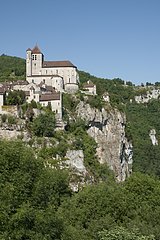 Church and village of St Cirq Lapopie cliff-edge Lot France