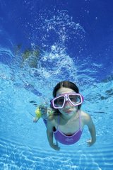 Apnea girl in a swimming pool in summer Côte d'Azur France