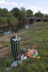 Trash overflowing Bank of the River Armançon France