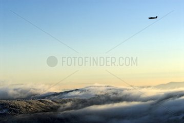 Plane over the Vosges in Winter view Kastelberg France