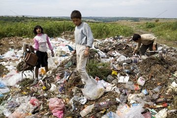 Gipsies Children sorting out scraps at the dustbin