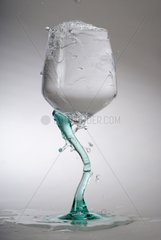 Overflowing with a glass of water design studio