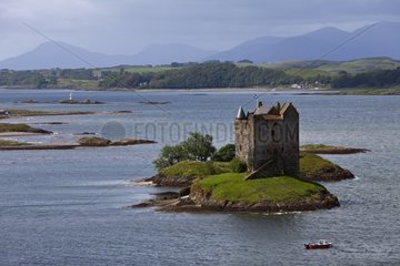 Castle on an island in a loch Scotland UK