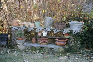 Pots and watering cans with frost