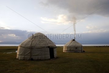 Two yurts near lake Son Kul at twilight Kyrgyzstan