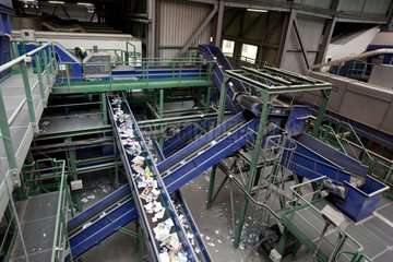 Paper on a treadmill in a sorting center in France