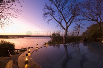 The River Club lodge at sunset on Zambesi River Zambia