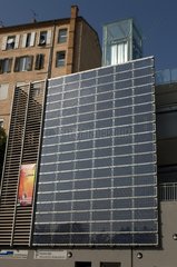 Facade photovoltaic panels in a building