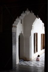 Child playing in the Bahia Palate of Marrakech Morocco
