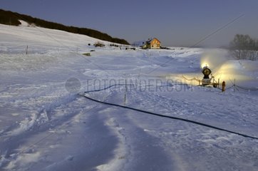 Canon snow on a Nordic ski trail in winter