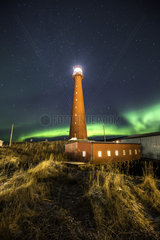 Northern light at Andenes Lighthouse  Andenes  Andøya island  North Atlantic Ocean  Norway.