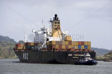 Container-ship towed on Panama Canal