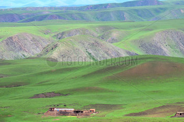 Mountain landscape with farm - Amdo Tibet China