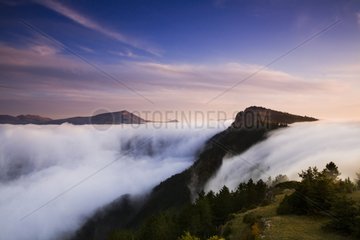 Cascade clouds fall on La Pale Barnave Vercors France