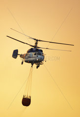 Helicopter in a forest fire. Wildfire. Ifonche 2012  Tenerife. Canary Islands.