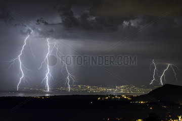 Multiple thunderbolts on Lake Geneva  facing Lausanne  Switzerland