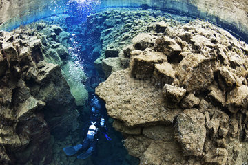 Diver in Silfra crack  Iceland.