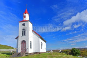 Church with red roof of Helgafell to the south of Stykkisholmur  Vesterland region in the peninsula of Snaefellsnes. It is surrounded by a cemetery. Iceland