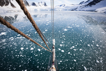 Landscape of sea and ice seen from the mast of a sailboat  Svalbard