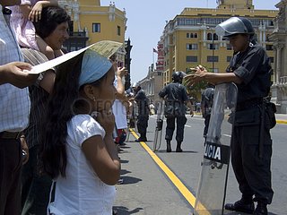 Police watching near the presidential palace Lima