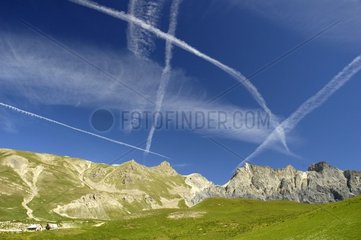 Traces of planes in the sky of the National park of Mercantour