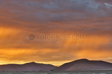 Light storm at dawn on the Namib Desert  Namibia