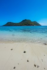 View of the M'tsamboro island from a sand bank that the tide discovers when it is low  Mayotte  Indian Ocean