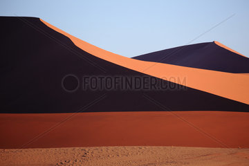 Dunes against the light in the Namib Desert  Namibia