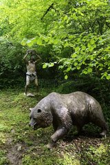 Cave bear (Ursus spelaeus ) and Hunter  Prehistoric Park  Dino Zoo   Charbonnières -les-Sapins   Franche -Comté   France