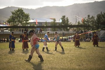 Mongolian wrestling  Traditional fighting burumbators (warriors) in Naadam festival - Tsetserleg  Mongolia