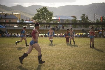 Mongolian wrestlers  Naadam Festival Tsetserleg  Mongolia