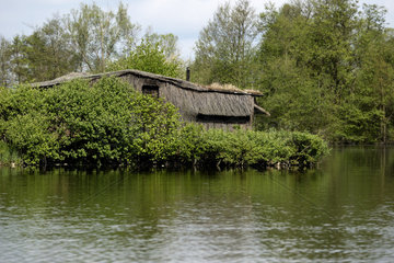 Hunting hut at the edge of a pond - France Picardie