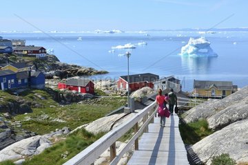 Denmark. Greenland. West coast. Wooden path in the village of Ilulissat.