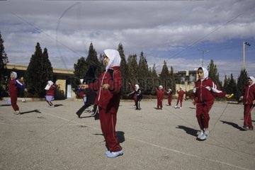 Group small buckled Iranian girls playing