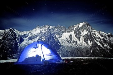 Enlightened tent the night on the Mont de la Saxe Italy