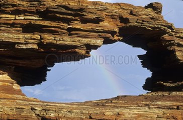 Natural window and rainbow Kalbarri National Park Australia