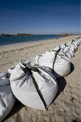 Big bags full of sand to protect the coast Tregastel France
