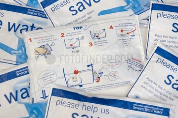Instructions for water hippo saveaflush bag placed in toilet