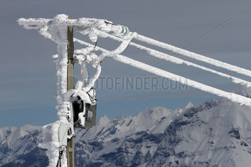 Ice electric pylon - Bauges Alpes France