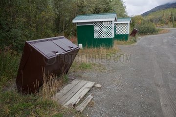 Bear-proof garbage cans and dry toilets on Alaska Highway