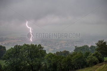 Thunderstorm and lightning on the lake in summer - France